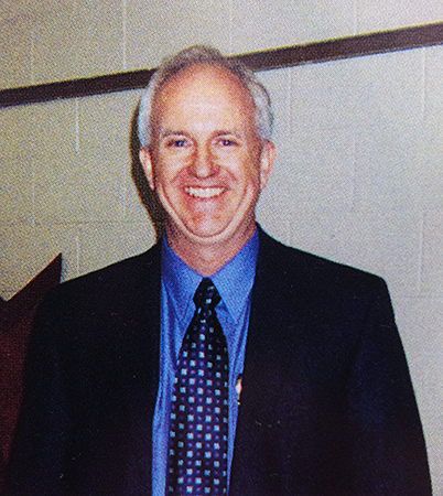 Head-and-shoulders portrait of Principal Harris taken during the 2003 to 2004 school year.