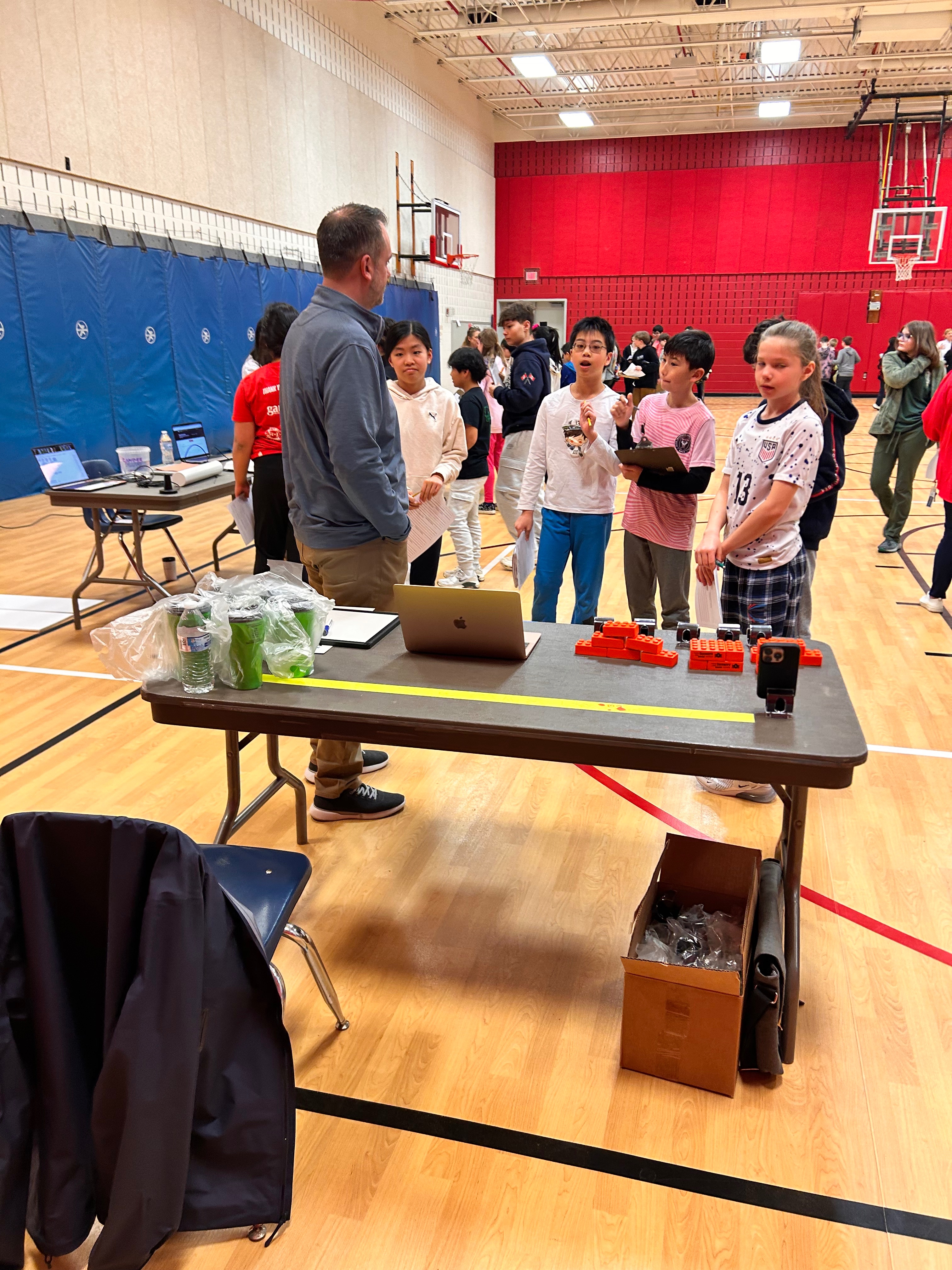 Students asking questions at career fair