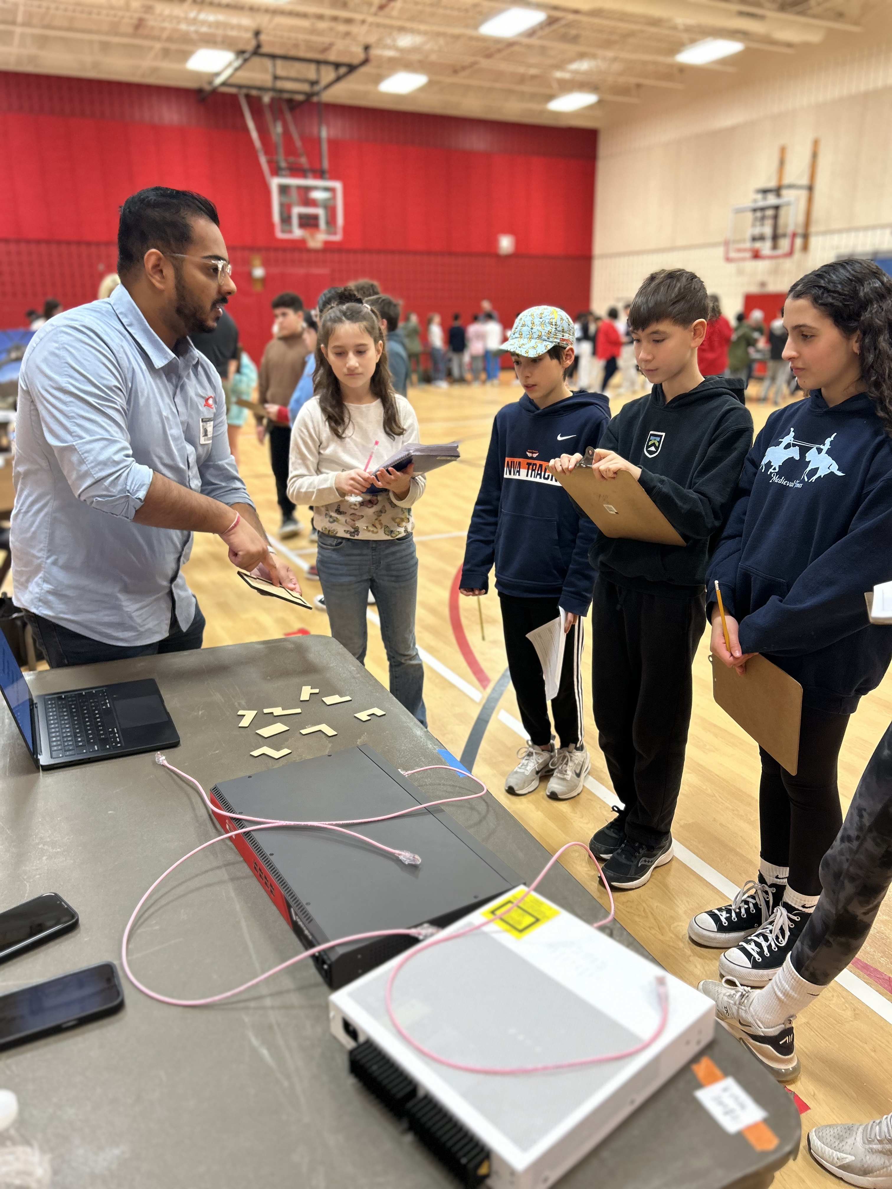 Students listening to career fair presentation